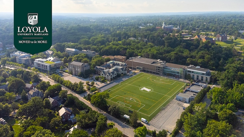 Aerial view of campus with the Loyola logo and Moved To Be More wordmark.
