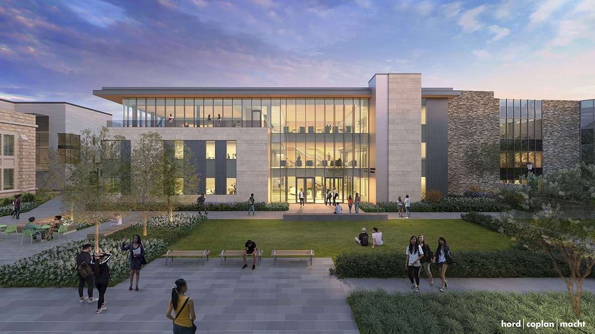 An architectural rendering shows an evening exterior front view of the future Donnelly Science Center, which showcases window walls with a warm glow emanating from inside and patio area.