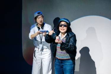 Two people on stage