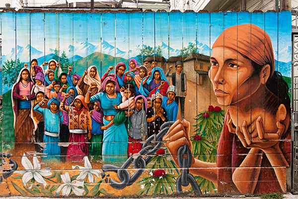 An image of mural from the US-Mexico border depicting the struggles and revolutionary attitudes of those who has suffered colonialism at the US and Mexican border