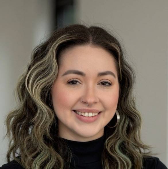 Marion Davidson headshot on blurred grey background
