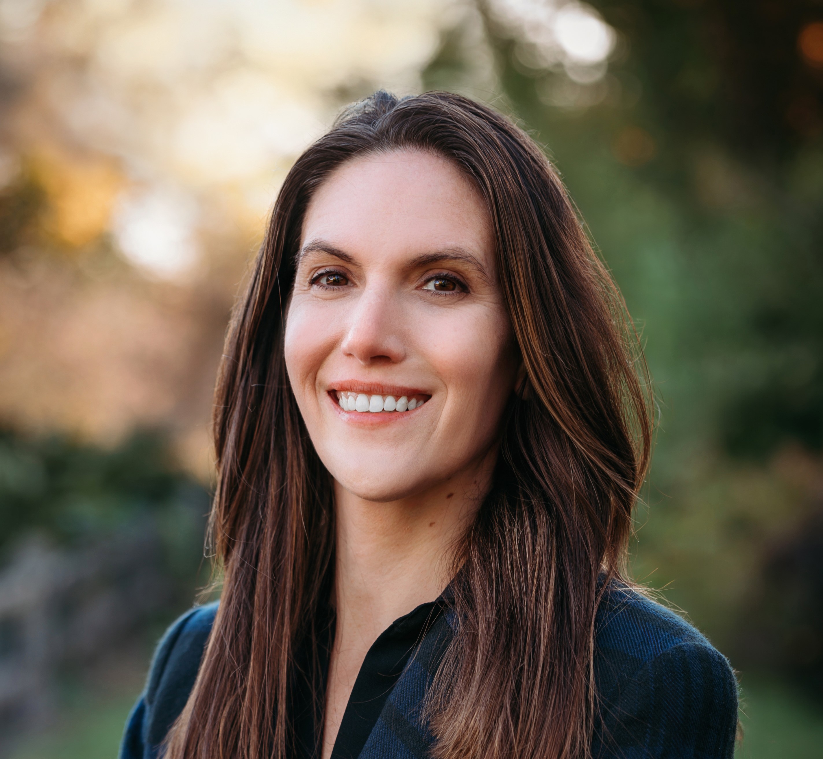 Jena Whitaker smiling at camera
