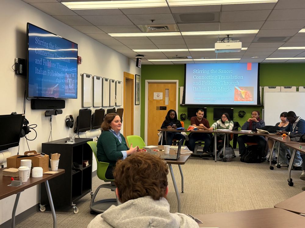 Dr. Emily Iekel lecturing to a group of students