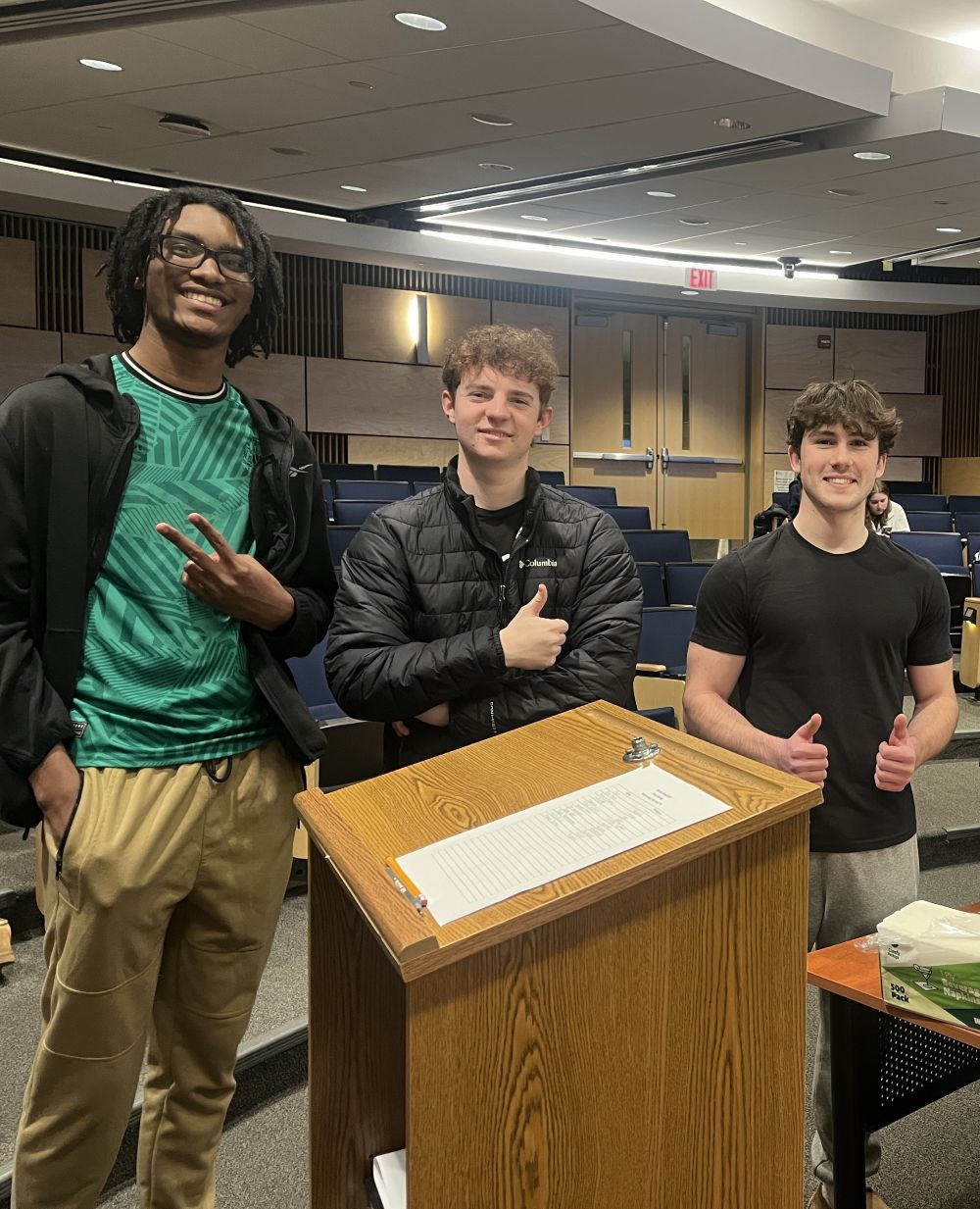 Students posing in front of camera
