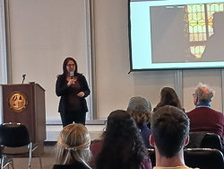 Marci Shore presenting in front of a crowd