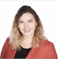 Dr. Brisson smiling in front of a white background