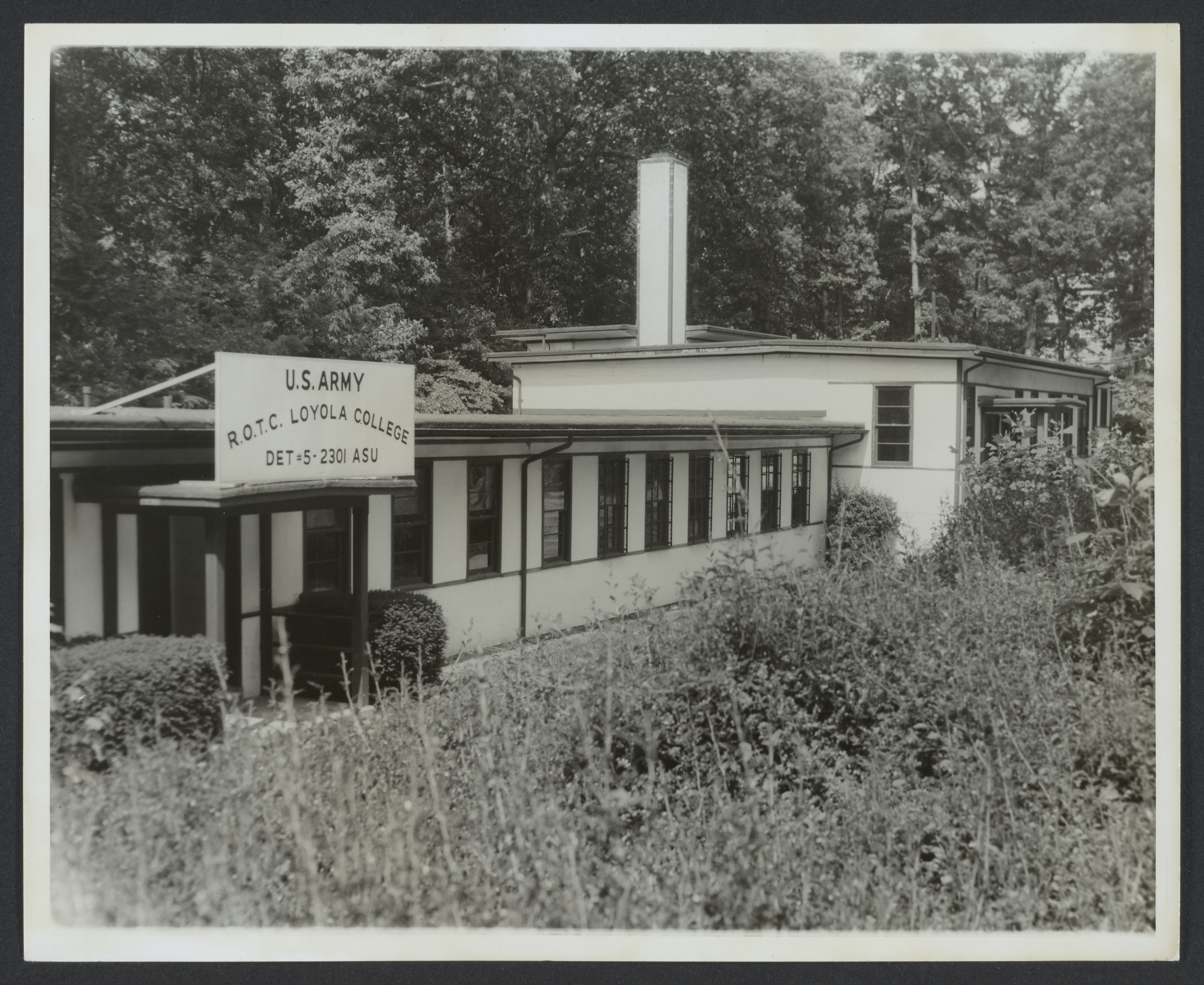 Photograph of the Dell Building entrance, Loyola College Army ROTC, ca. 1960–1982.