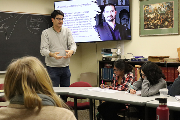 Dan Castillo teaching with students