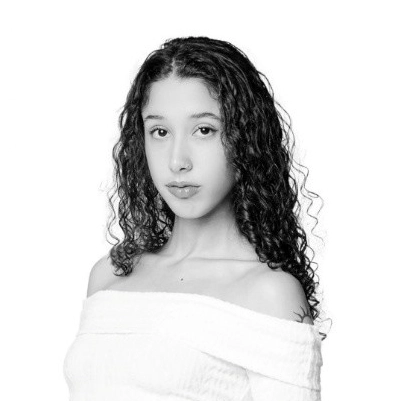 Professional headshot of Isabel Peguero