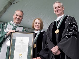 Photo of Nick and Suzie Simon with Terrence Sawyer, president of Loyola University Maryland