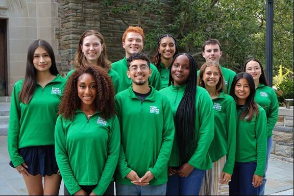 Group photo of 2026-2027 LCA team in green shirts