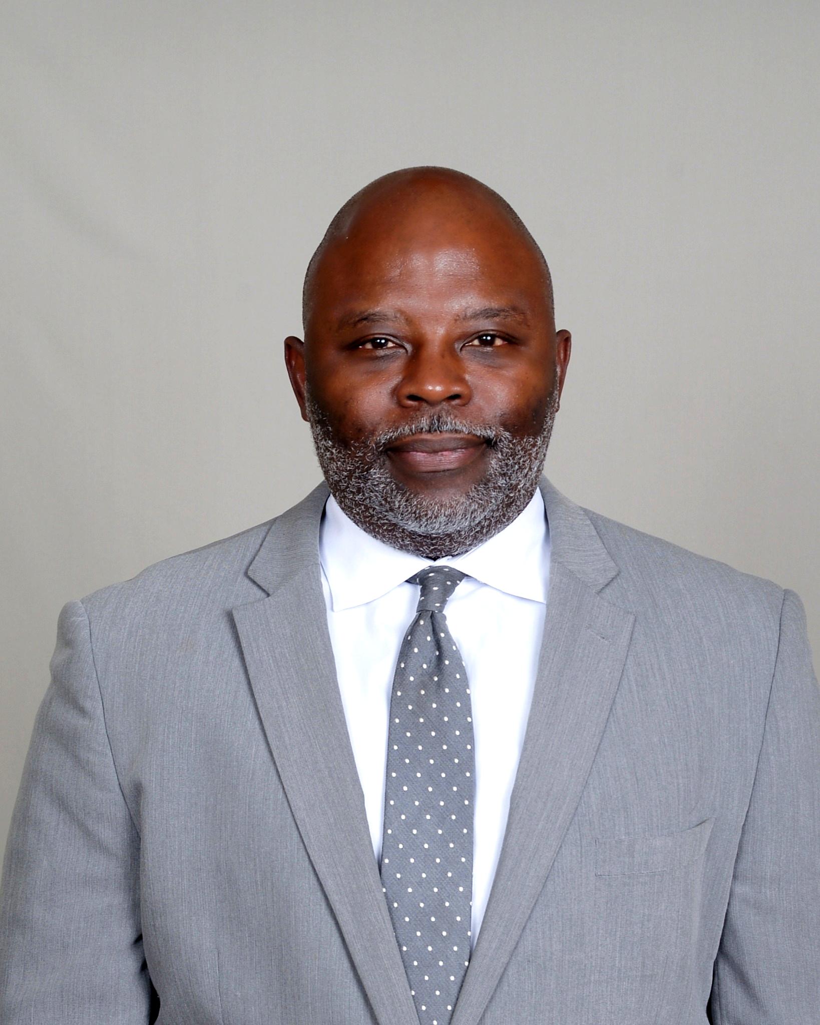 Professional man in grey suit