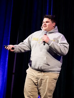 Andrew presenting at a pitch event at Loyola