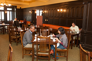 People dining together in Refectory dining room