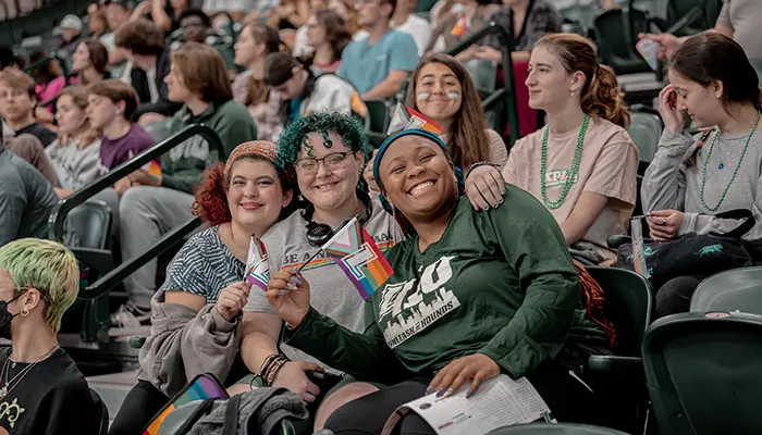 Students smile at the LGBTQ sport event