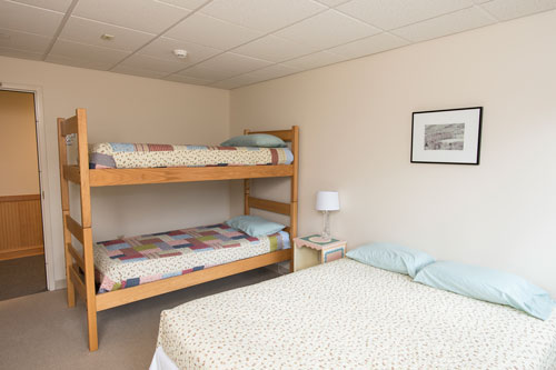 Full bed with bunk beds