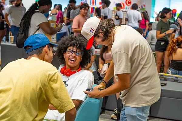 ALANA students laugh together at an event