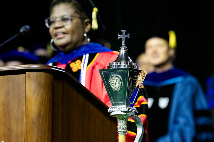 The Loyola Mace is an ornamental lantern, emblazened with the Loyola seal