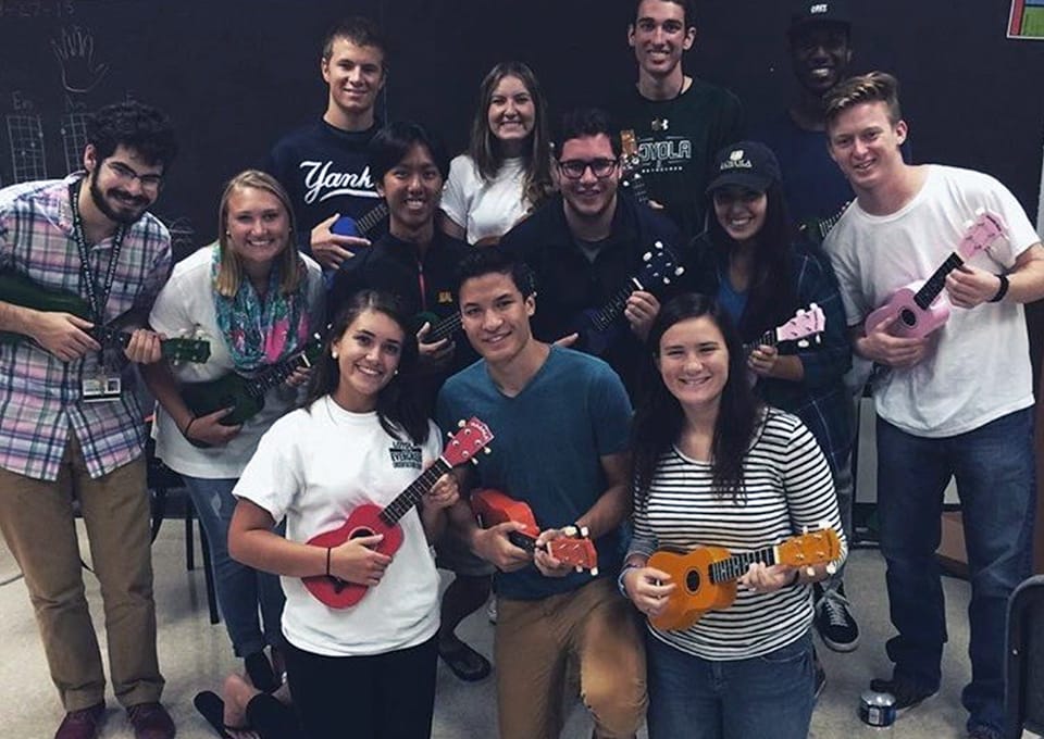 A large group of students posing with ukuleles