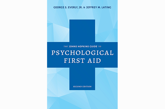 Book cover of 'The Johns Hopkins Guide to Psychological First Aid'