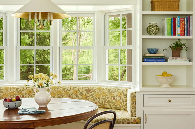 Dining room with tables and chairs.