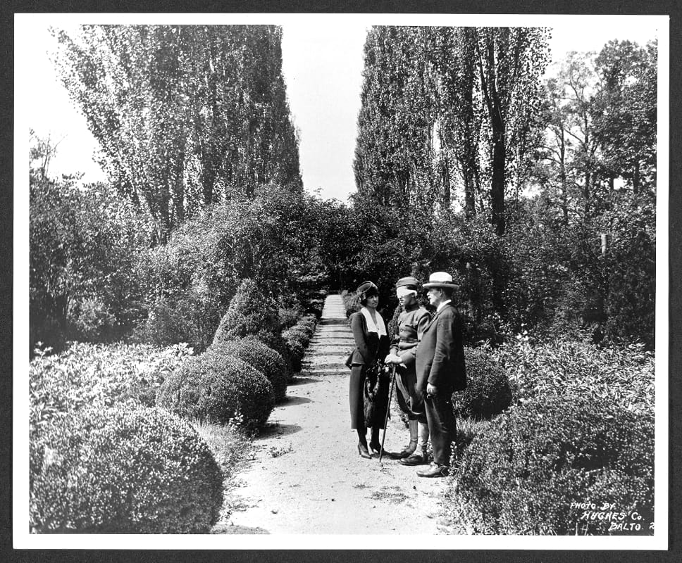 Blind veterans in the mansion courtyard