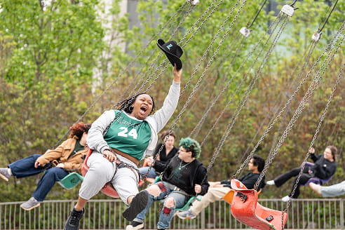 Loyola Students on an amusement park ride