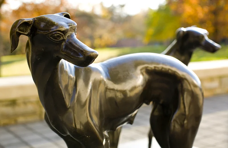 Bronze statue of two greyhounds
