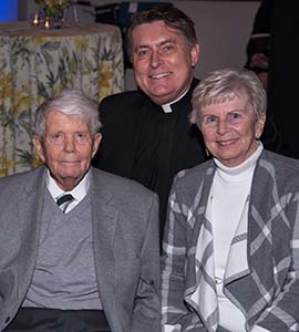 Hans Wilhelmsen, M.D., DDS, '52, and Leah Wilhelmsen with Rev. Brian F. Linnane, S.J.