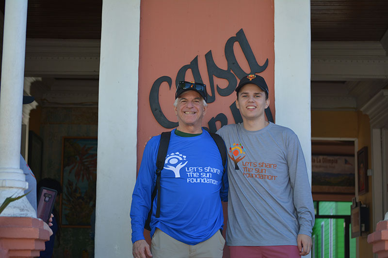 Peter Graham, '25, and Bill Jordan, founder and CEO of Jordan Energy and co-founder of Let's Share the Sun.