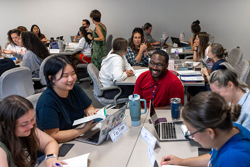 Loyola School of Education graduate students in class.