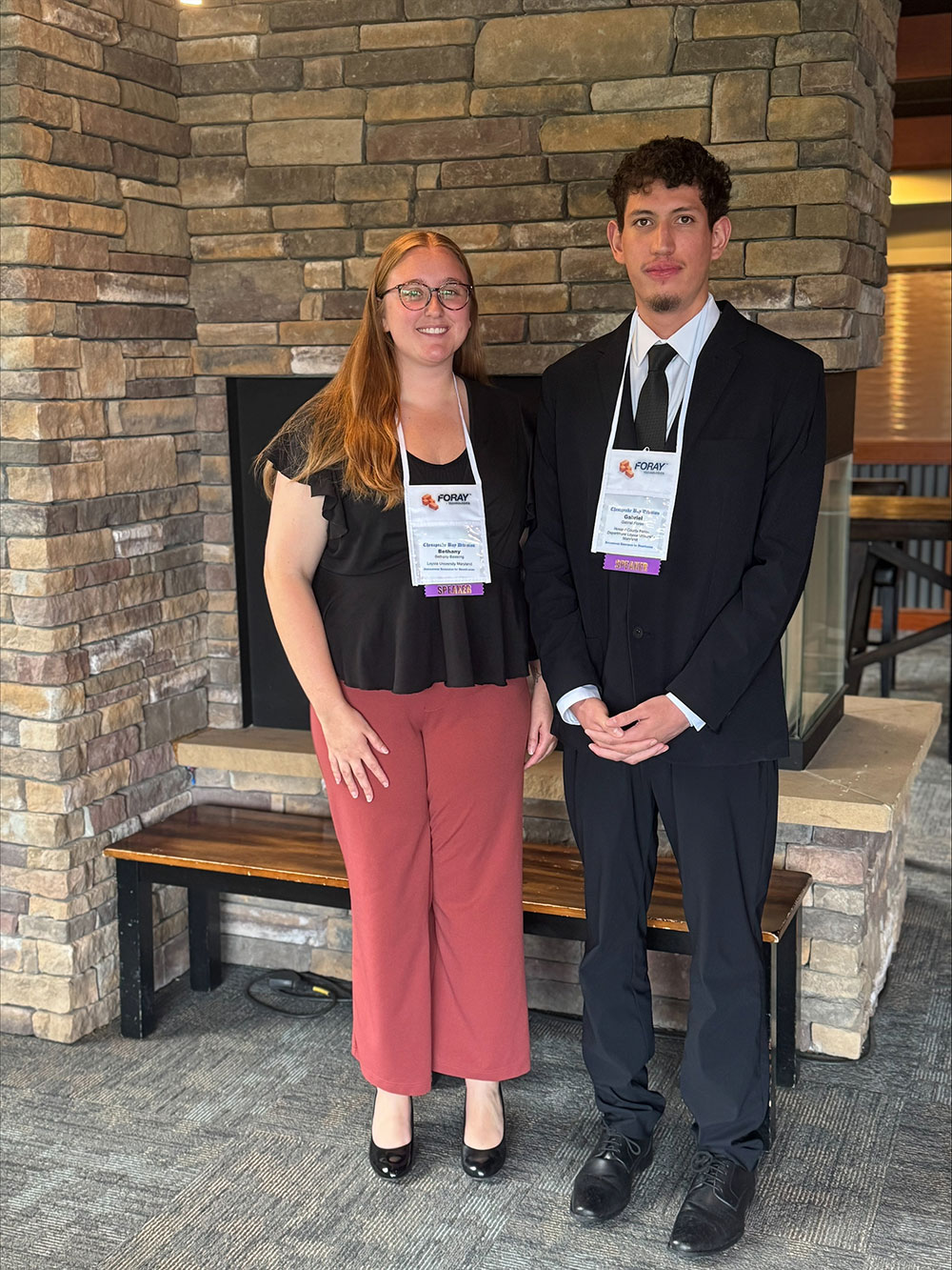 Bethany Bessling, '25, and Gabriel Flores, '25, at the CBDIAI conference in June 2025 