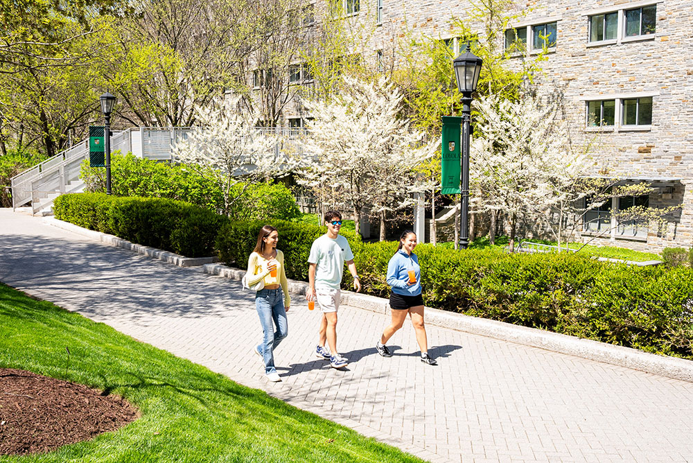 Students walk on Loyola's Quad in Spring 2026