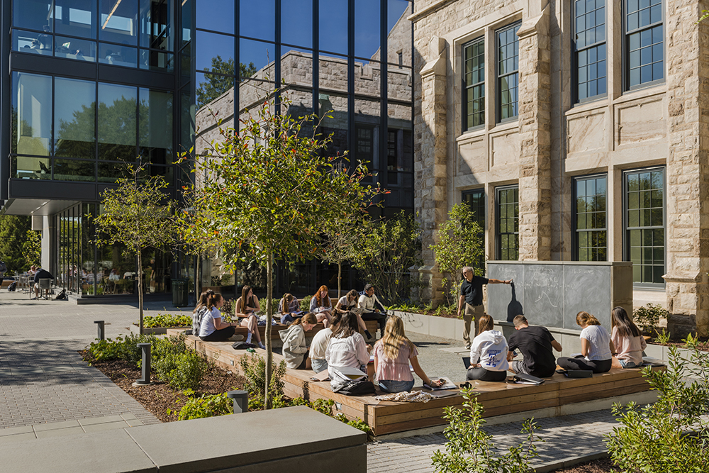 Students gather in the outdoor classroom for class