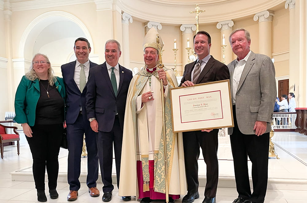 Trustee Dan Rizzo with Archbishop of Baltimore William E. Lori, President Terry Sawyer, and Loyola colleagues including Rita Buettner, Brian Oakes, and Tim Durkin