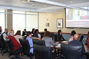 Conference attendees participating in a breakout session