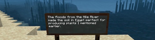 Minecraft screenshot with a sign that says 'The floods from the Nile River made the soil in Egypt perfect for producing plants I mentioned earlier.'