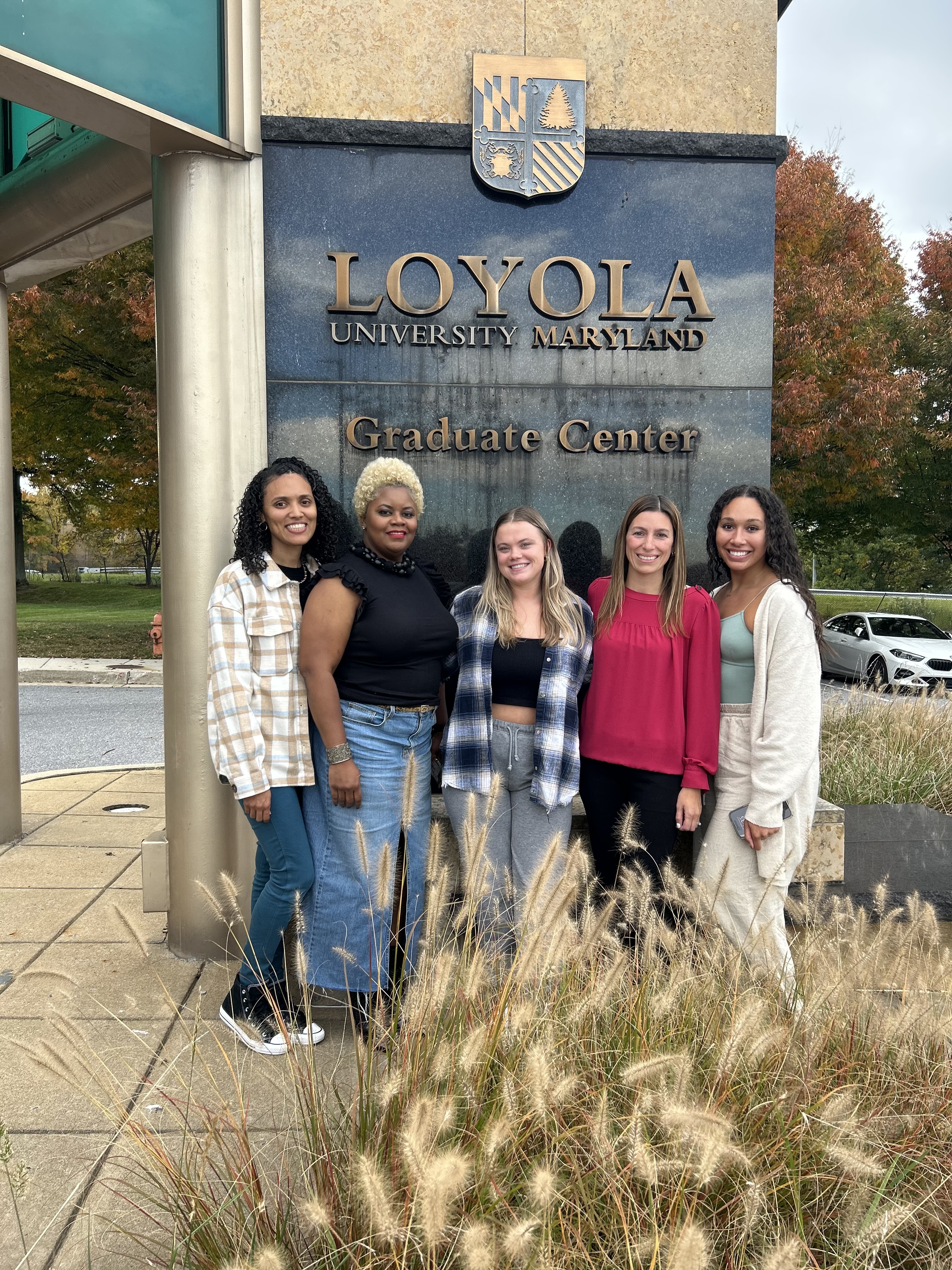 Students stand in front of the Loyola Graduate Center in Timonium Maryland